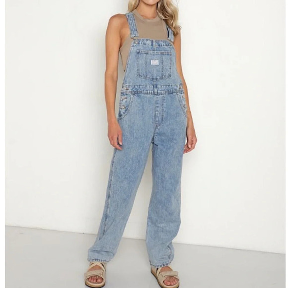 Vintage Levi’s faded blue denim overalls size medium